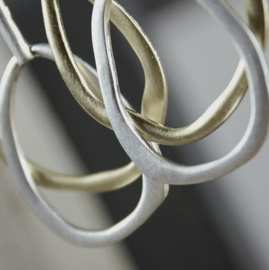 DNSK OVAL DROP EARRINGS