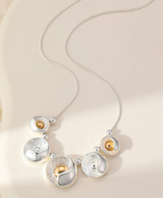 MIXED METAL CIRCLE NECKLACE