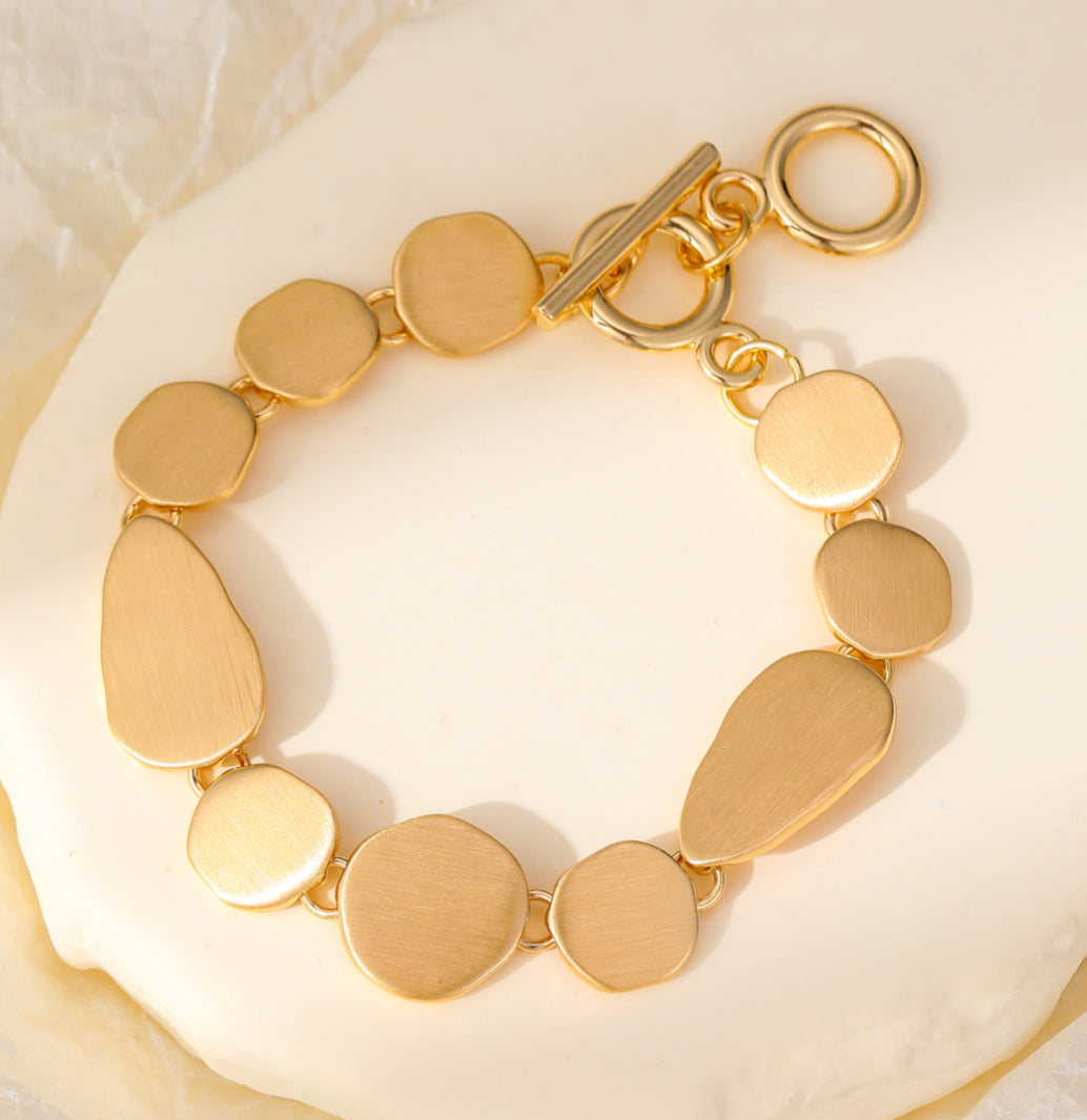 SHAPES T-BAR BRACELET - MATT GOLD