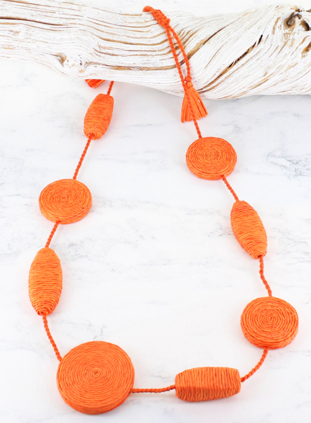 LONG ORANGE RAFFIA DISC NECKLACE