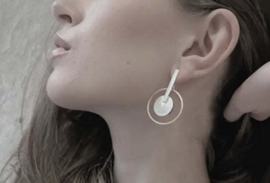 DNSK CIRCLE DROP EARRINGS