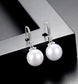 WHITE PEARL DROP EARRINGS WITH DIAMANTÉ DETAIL