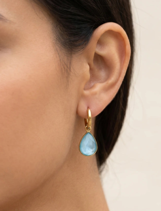 CRYSTAL HUGGIE EARRINGS- BLUE