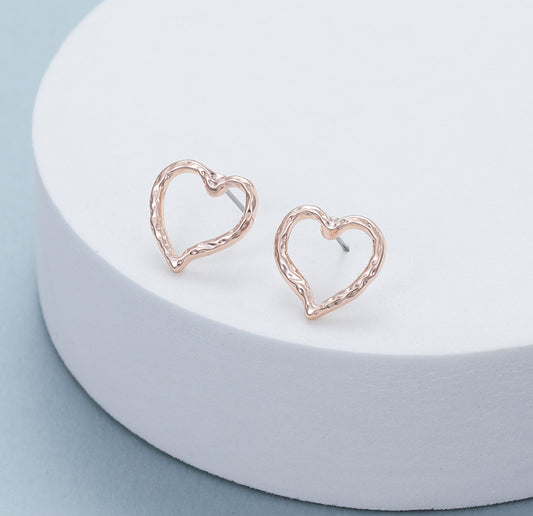 HAMMERED HEART STUDS - ROSE GOLD