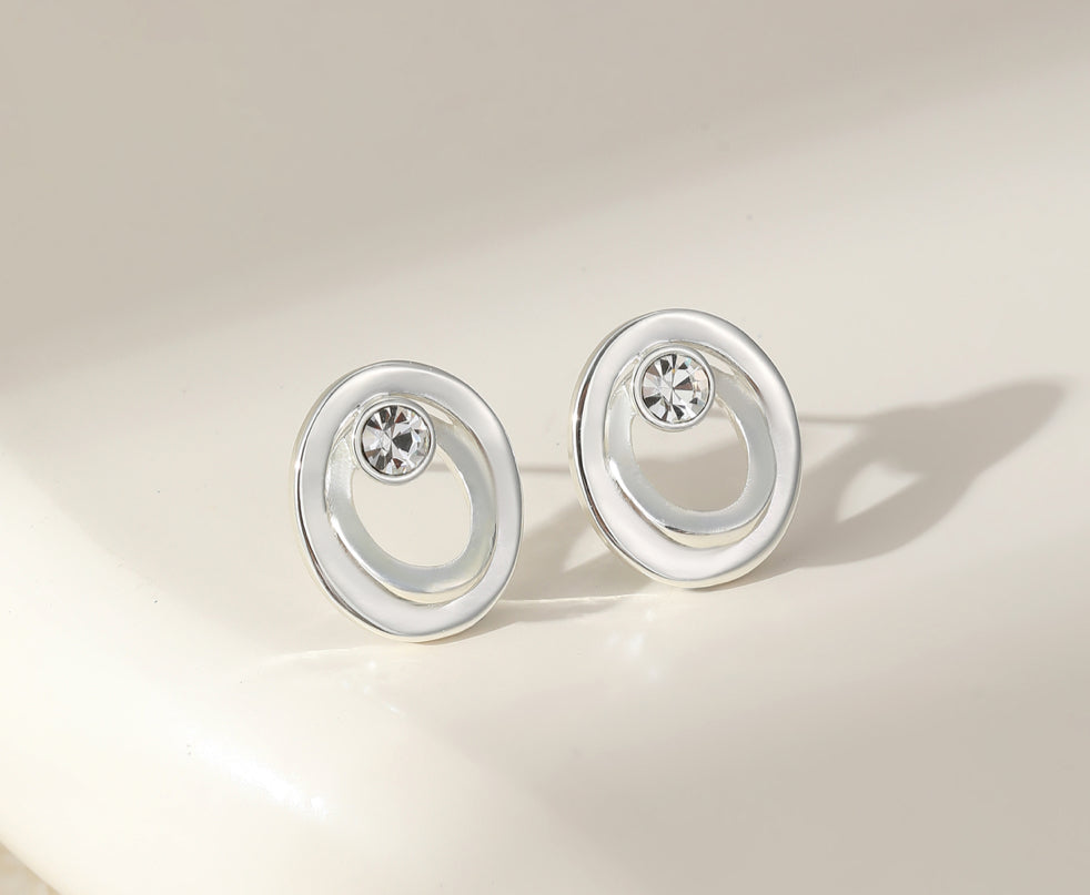 OVAL CRYSTAL STUDS - MATT SILVER