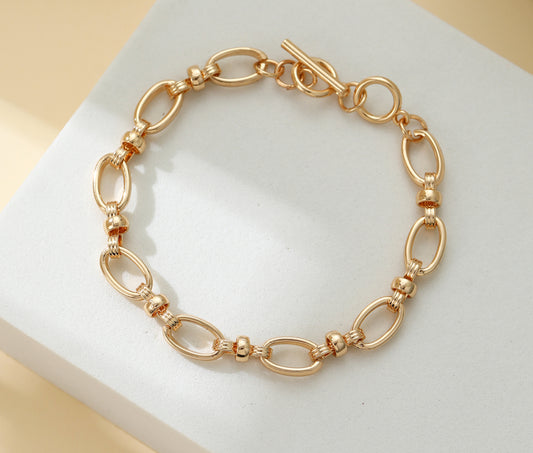 OVAL LINK T-BAR BRACELET - GOLD