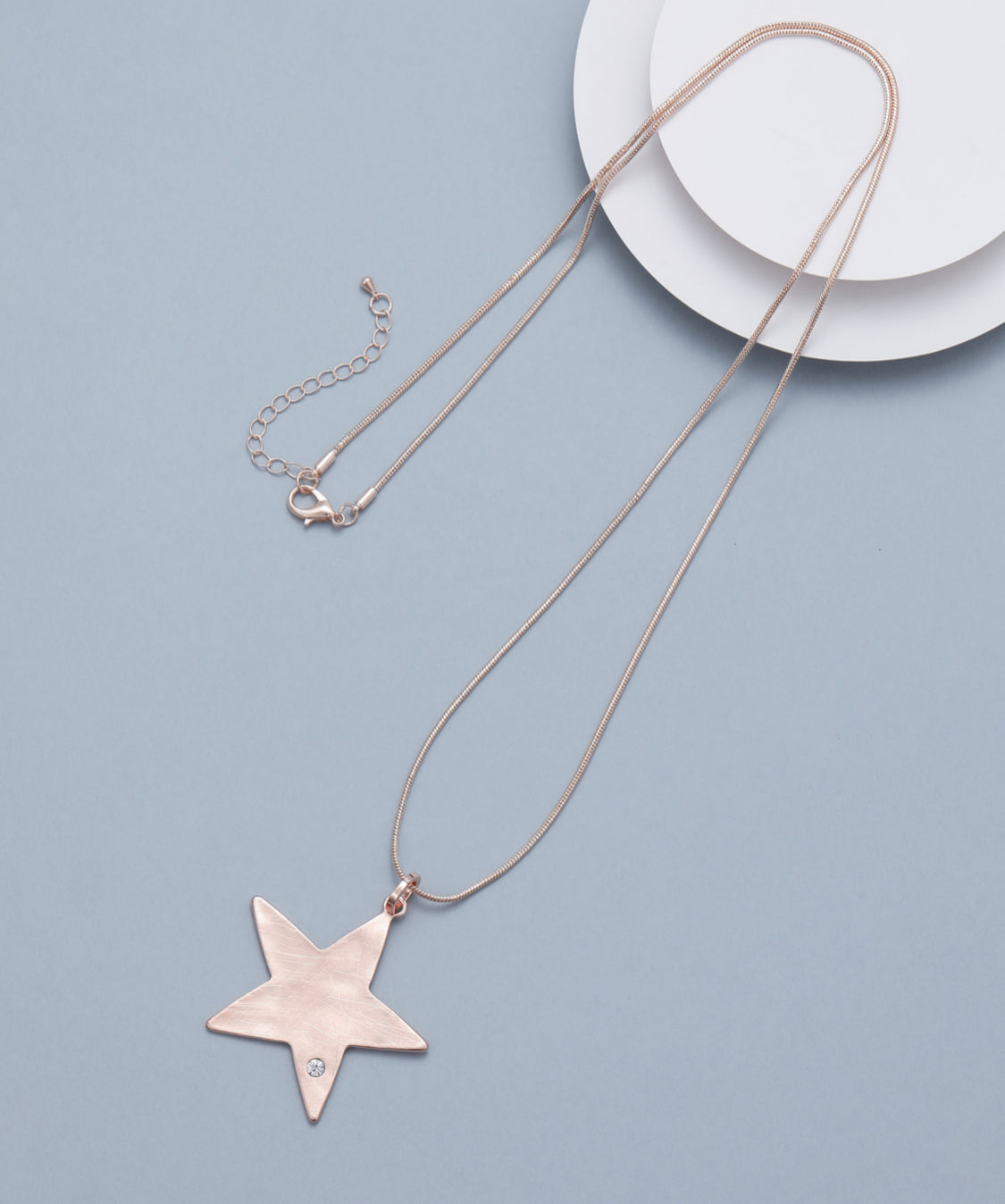 LONG ROSE GOLD DIAMANTÉ STAR NECKLACE