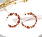 RUST FLOWER STATEMENT HOOPS